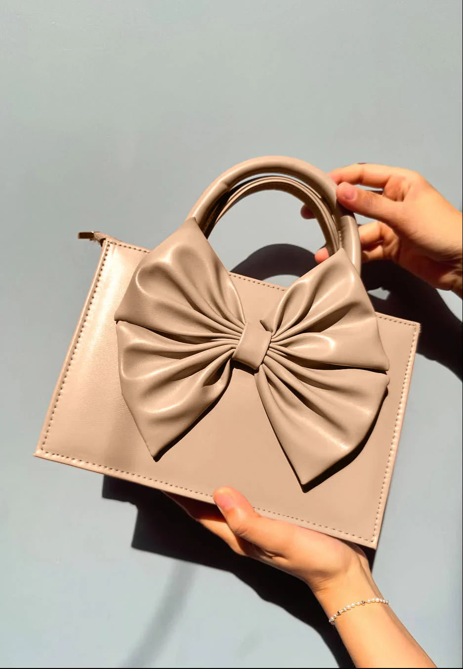 Buy HandBag Gloss Bow Beige in Pakistan