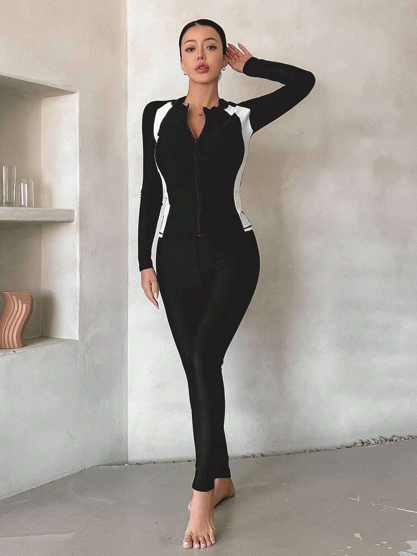 Buy SHEIN DAZY Women's Sporty Swimwear Jacket, Black And White Color Block Long Sleeve Zipper Swim Coat, Conservative Sun-Protective Slim-Fit Swimming Jacket, Suitable For Vacation Diving (Without Pants) Summer in Pakistan