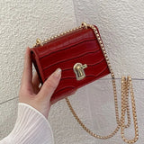 Buy Orb & Gravel Red Leather Mini Bag in Pakistan