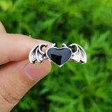 Buy Orb & Gravel Black Heart Wings Ring in Pakistan