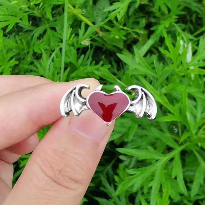 Buy Orb & Gravel Red Heart Wings Ring in Pakistan