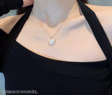 Buy Orb & Gravel Gold Saturn Necklace in Pakistan