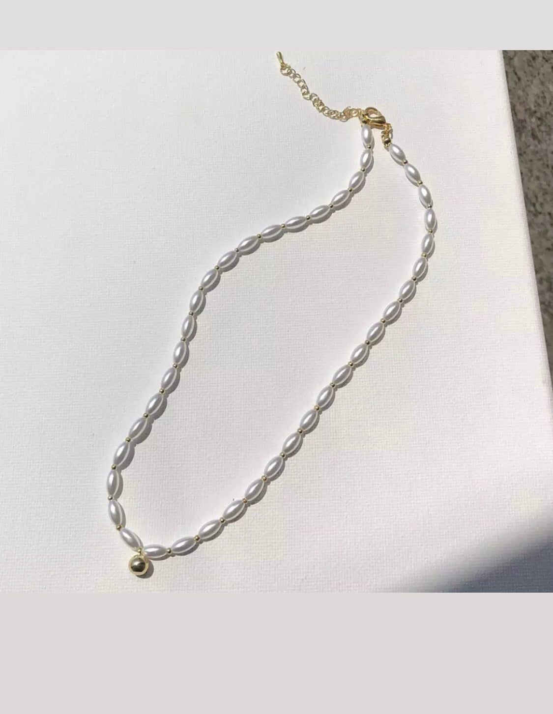 Buy Orb & Gravel Imitation Pearls Gold Necklace in Pakistan