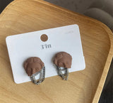 Buy Orb & Gravel Statue Vintage Chain Earrings in Pakistan