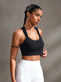 Buy SHEIN Powerista Women's Solid Color Stretch Criss-Cross Seamless Wirefree Sports Bra in Pakistan