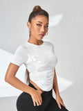 Buy SHEIN Cut Out Back Raglan Sleeve Crop Sports Tee Fitted Shirt in Pakistan