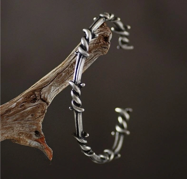 Buy Orb & Gravel Barbel Wire Stainless Steel Bracelet in Pakistan