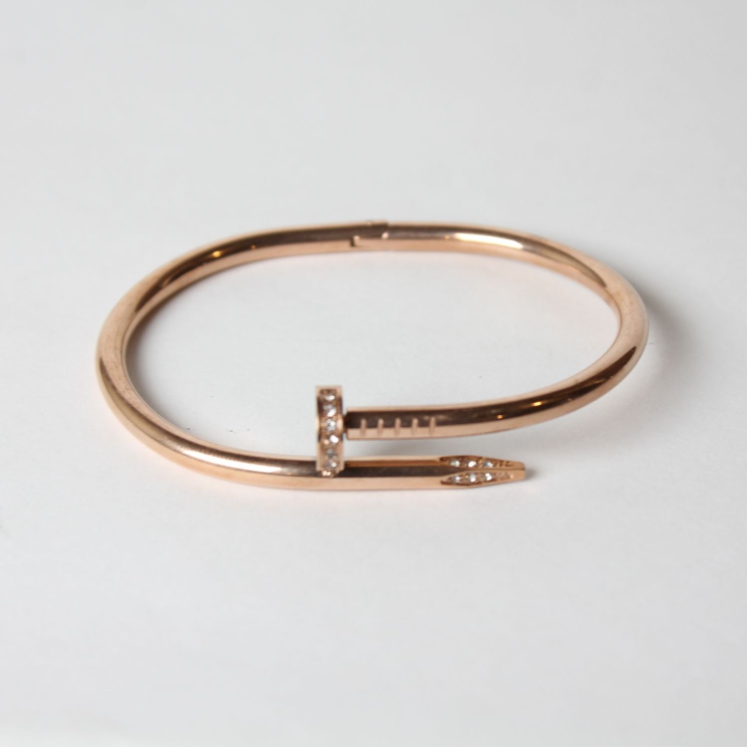 Buy Rose Gold Nail Bangle Bracelet in Pakistan
