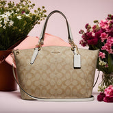 Buy Coach Kelsey Satchel In Signature Canvas Bag - Gem in Pakistan