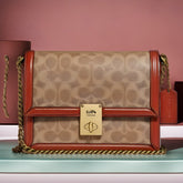 Buy Coach Coated Canvas Signature Hutton Shoulder Small Bag - Tan Rust in Pakistan