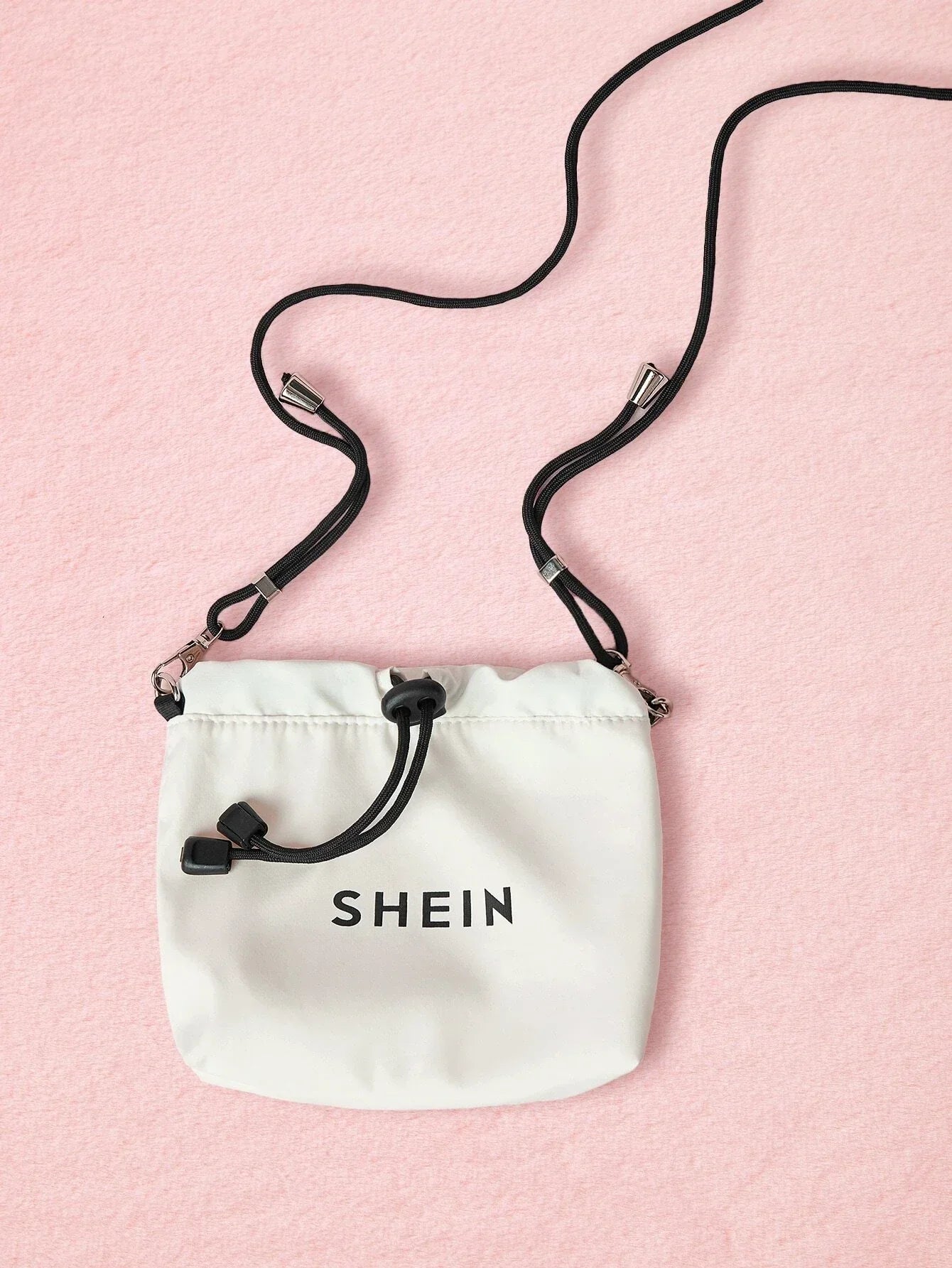 Buy Shein Letter Graphic Drawstring Crossbody Bag in Pakistan