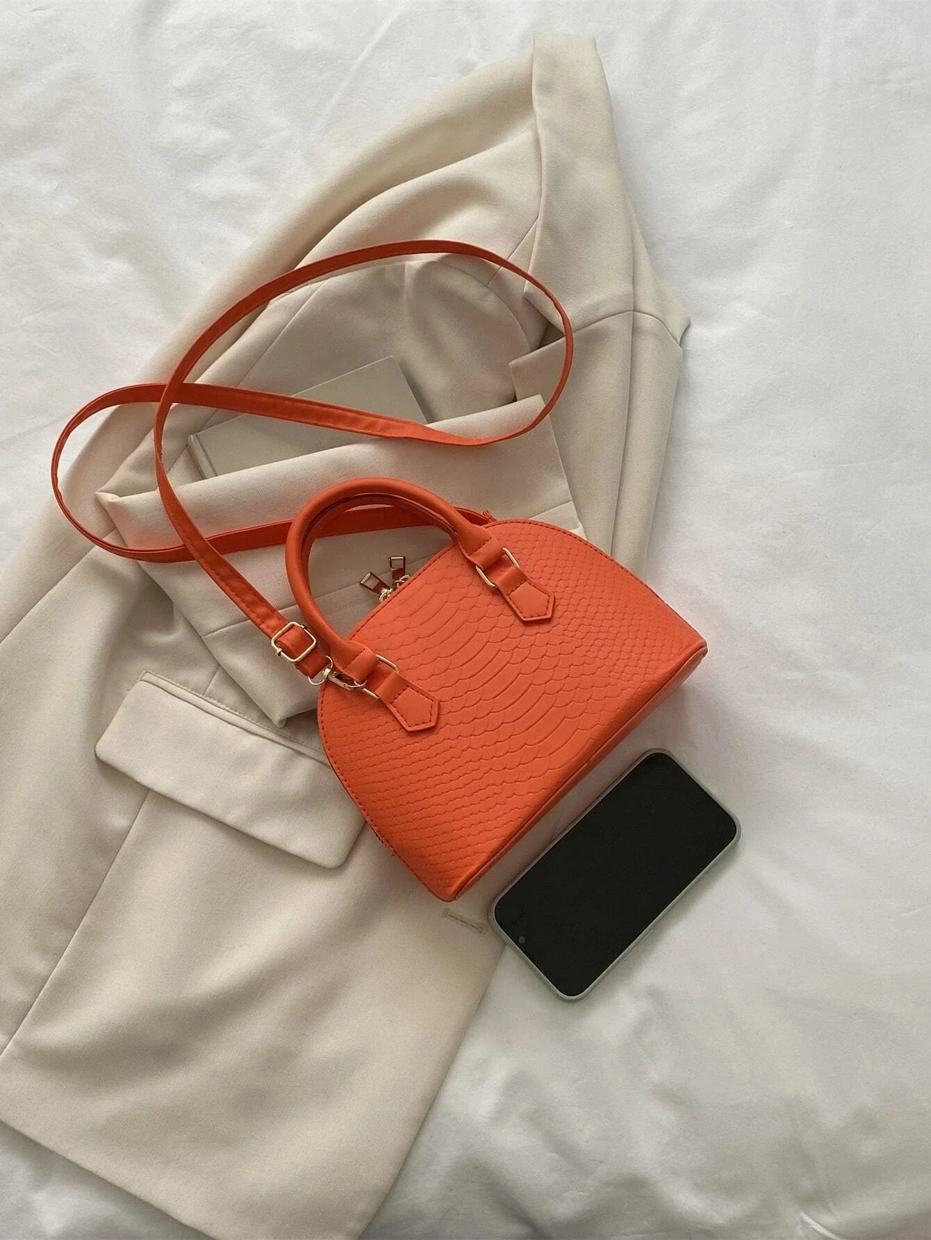 Buy SHEIN Neon Orange Snakeskin Embossed Dome Bag in Pakistan