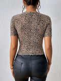 Buy SHEIN Privé Leopard Print Cross Wrap Hem Crop Tee in Pakistan