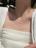 Buy SHEIN 1pc Golden Plated Stainless Steel Necklace With White Acrylic Heart Pendant in Pakistan