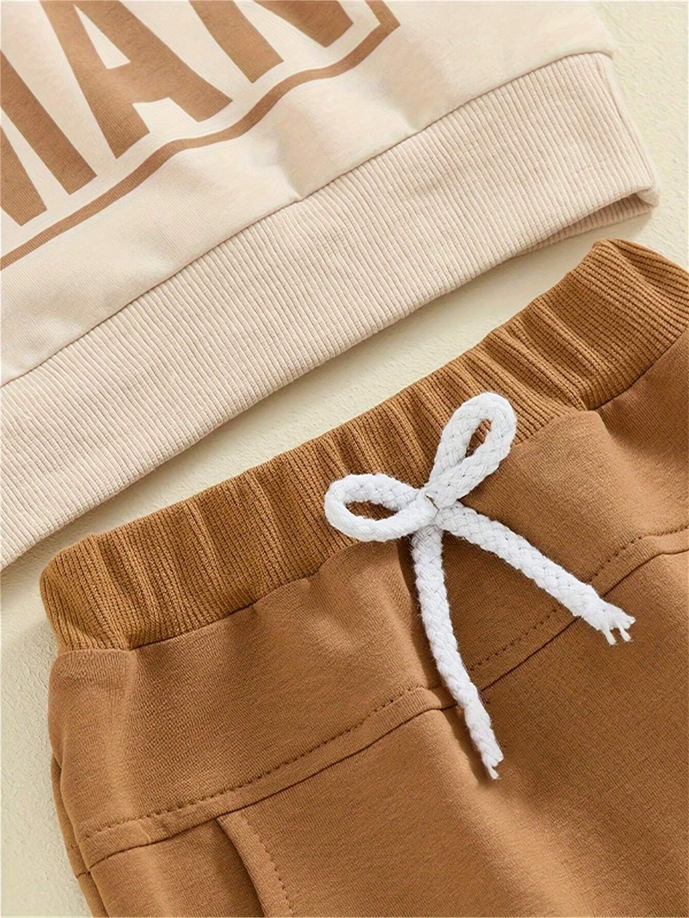 Buy SHEIN 2pcs Baby Boy "Mom's Little Man" Letter Print Long Sleeve Sweatshirt And Pants Sports Suit in Pakistan