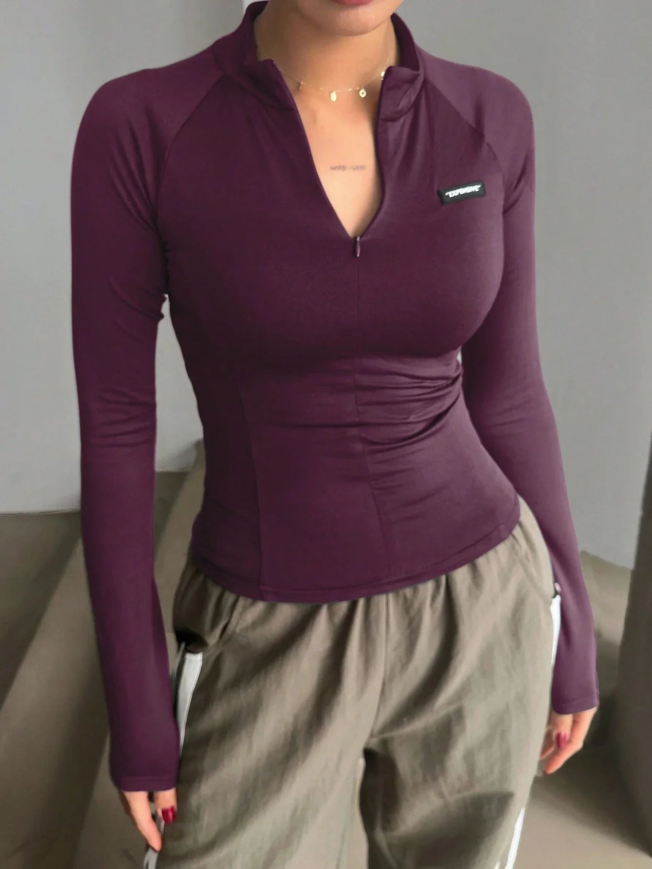 Buy SHEIN DAZY Half High Collar Half Zip Up Letter Silicone Tight Long Sleeve Women T-Shirt in Pakistan