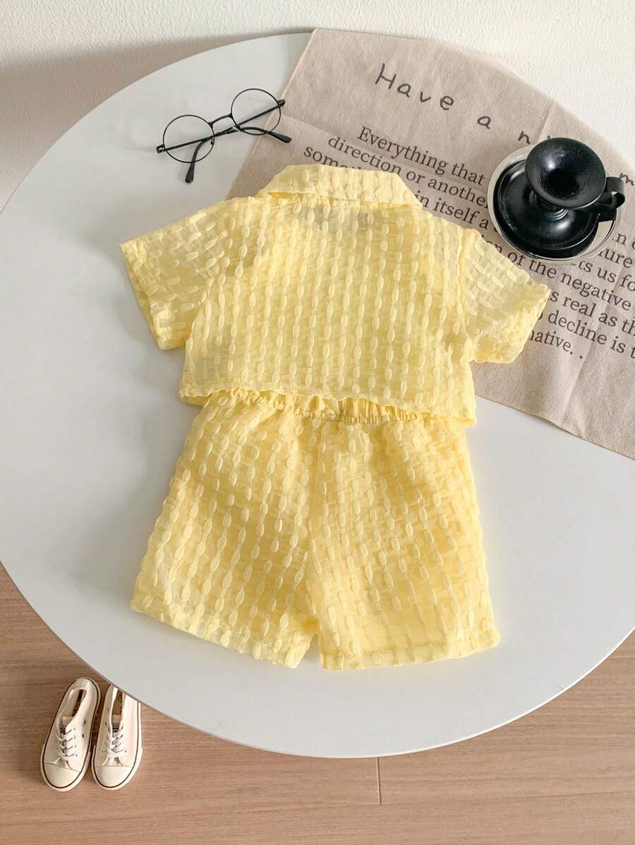 Buy SHEIN Genkimix Kids Baby Girls' Holiday Leisure Style Textured Fabric Short Sleeved Shirt + Shorts + Suspenders Romper 3pcs Set - Perfect For Daily Wear, Exclusive For Summer in Pakistan
